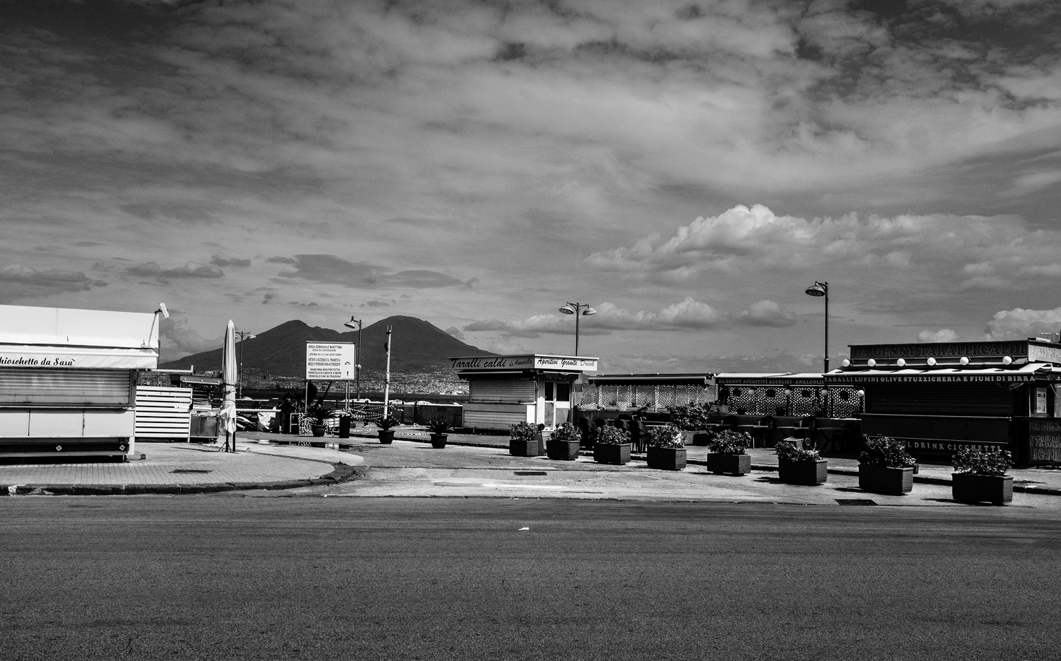 The empty streets in Naples the Mount Vesuvius in the background. An attentive monitoring of the many ways in which organized crime adapts to changing conditions is a real priority in a city like Naples 