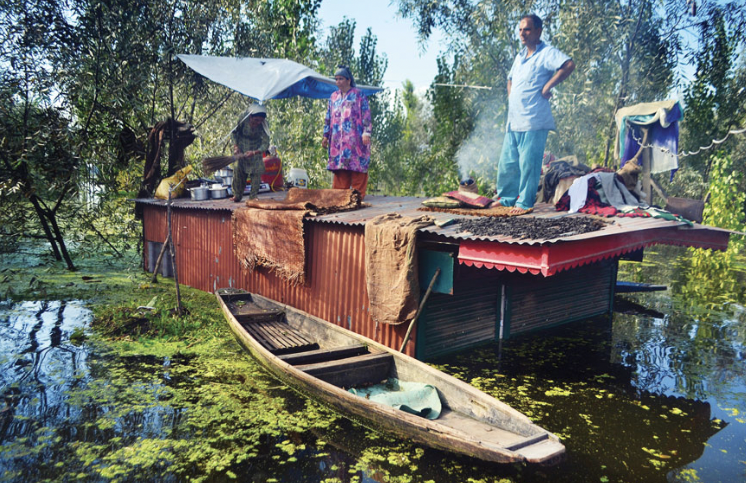 Syed Shahriyar / Family finds shelter on Dal Lake, Srinagar 2014